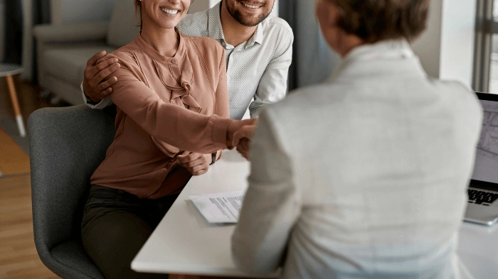 happy couples with a UK spouse visa lawyer